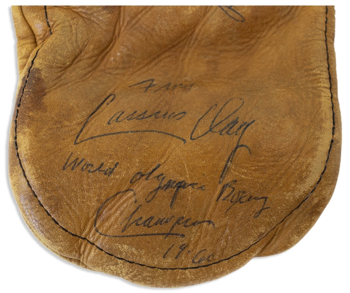 Muhammad Ali Signed Boxing Glove From the Early 1960s as Cassius Clay -- Ali Signs ''Cassius Clay / World Olympic Boxing Champion / 1960'' -- Gorgeous, Bold Signature With COA From Craig R. Hamilton